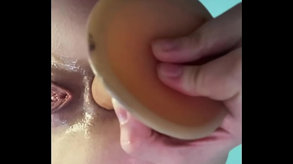 Anal fucking close up. Double penetrating with huge dildo