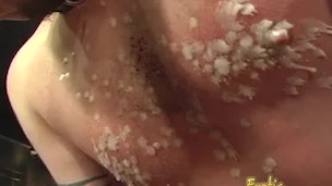 Two hot latex-clad babes have some fun with a raunchy dude